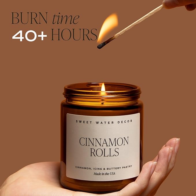 Sweet Water Decor Cinnamon Roll Candle - Fall Candle with Cinnamon, Icing & Buttery Pastry for Home - Soy Candles with 40 Hours Burn Time - 9Oz Black Lid Amber Jar Holiday Scents