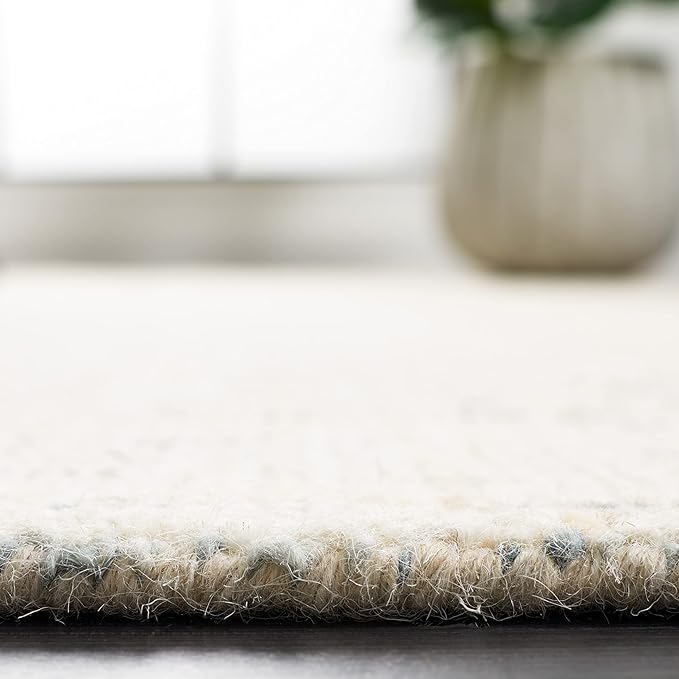 SAFAVIEH Abstract Collection Area Rug - 9' x 12', Ivory & Blue, Handmade Wool, Ideal for High Traffic Areas in Living Room, Bedroom (ABT468M)