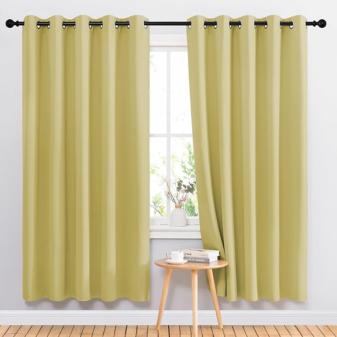 NICETOWN Room Darkening Curtain Panels 72 - Window Treatment Energy Saving Thermal Insulated Solid Grommet Room Darkening Drapes for Living Room (Paler Yellow, 1 Pair, 66 by 72-Inch)