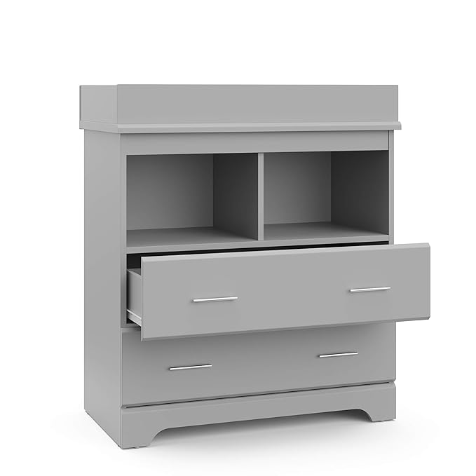 Storkcraft Brookside 2 Drawer Changing Table Dresser (Pebble Gray) – GREENGUARD Gold Certified, Easy-to-Match Chest of Drawers and Cubbies for Nursery and Kids Bedroom, Includes Changing Table Topper