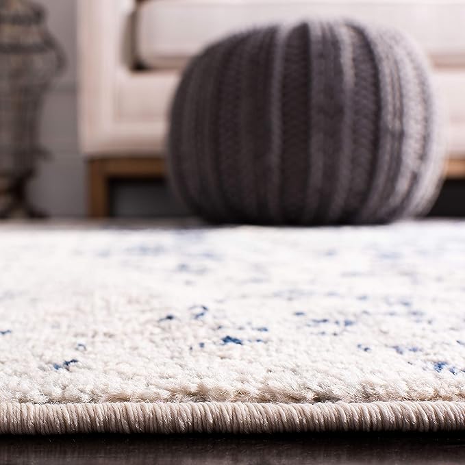 SAFAVIEH Madison Collection Accent Rug - 2'3" x 4', Cream & Navy, Snowflake Medallion Distressed Design, Non-Shedding & Easy Care, Ideal for High Traffic Areas in Foyer, Living Room, Bedroom (MAD603D)