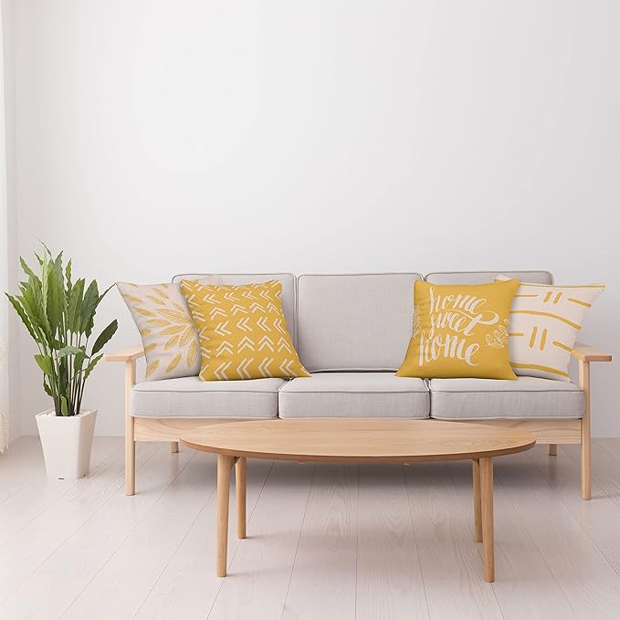 Ambesonne Modern Throw Pillow Cushion Case Pack of 4, Scandinavian Minimal Ornaments Boho Feather Leaves and Home Phrase, Modern Accent Double-Sided Digital Printing, 24", Pale Tan and Earth Yellow