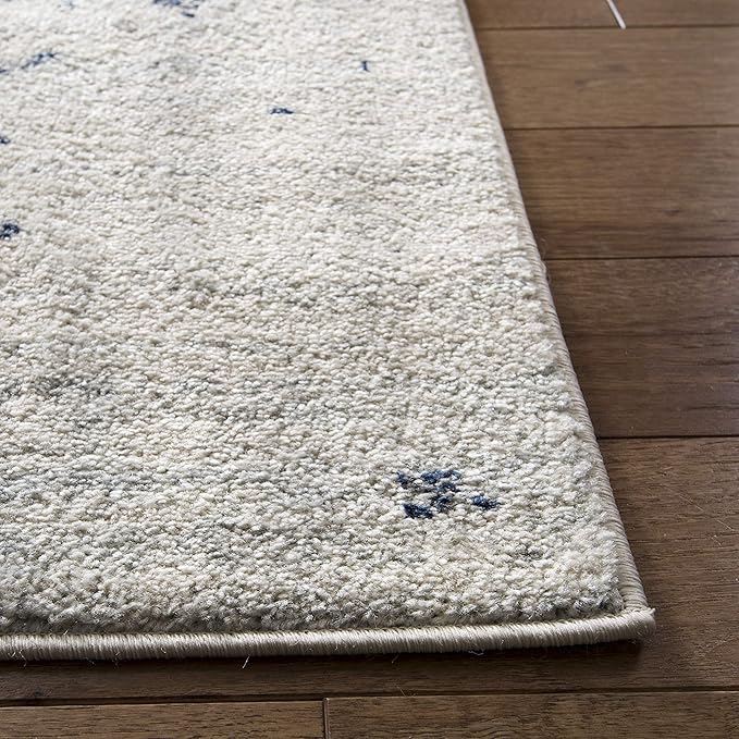 SAFAVIEH Madison Collection Area Rug - 6'7" x 9'2", Cream & Navy, Snowflake Medallion Distressed Design, Non-Shedding & Easy Care, Ideal for High Traffic Areas in Living Room, Bedroom (MAD603D)