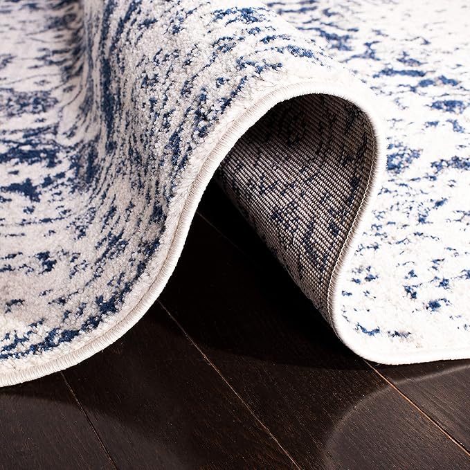 SAFAVIEH Madison Collection Accent Rug - 2'3" x 4', Cream & Navy, Snowflake Medallion Distressed Design, Non-Shedding & Easy Care, Ideal for High Traffic Areas in Foyer, Living Room, Bedroom (MAD603D)