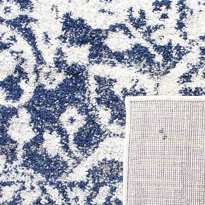 SAFAVIEH Madison Collection Accent Rug - 2'3" x 4', Cream & Navy, Snowflake Medallion Distressed Design, Non-Shedding & Easy Care, Ideal for High Traffic Areas in Foyer, Living Room, Bedroom (MAD603D)